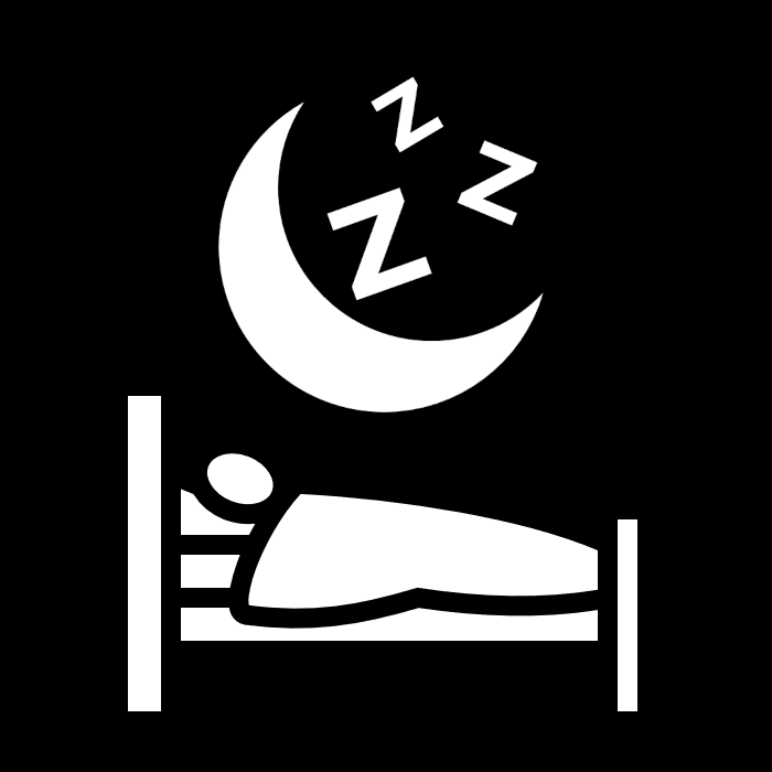 a person sleeping in a bed with a crescent moon and zzzs